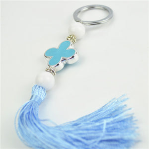 Blue cross keyring bombonniere.