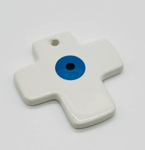 Ceramic cross with evil eye bombonniere.