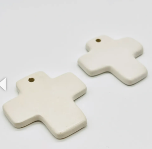 White ceramic cross bombonniere.