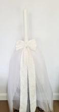 Load image into Gallery viewer, The Mila Bow Orthodox Candle is made up or Pearl Lace and completed with a full Tulle Skirt.